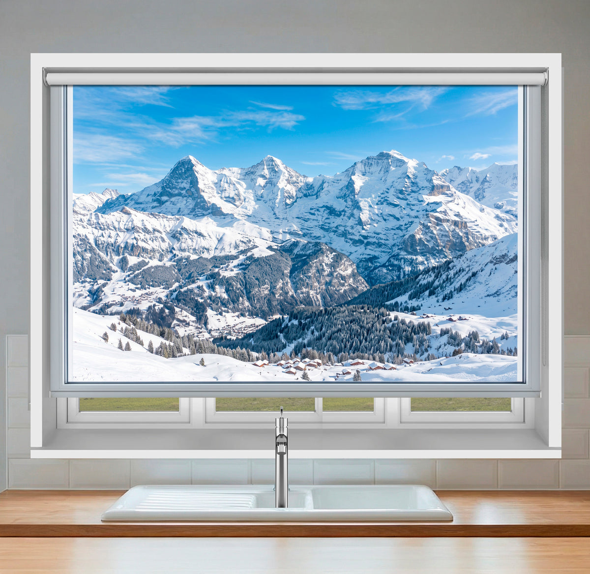 Art Fever scenic faux window roller blind showing the Swiss Alps, styled behind a freestanding white bathtub in a bright bathroom.