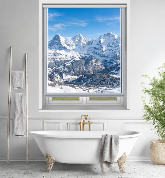 Art Fever faux window roller blind featuring a snowy mountain landscape, installed over a modern kitchen sink.