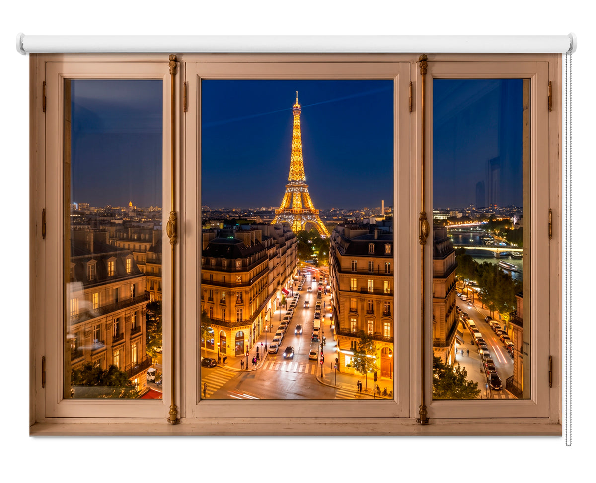 Art Fever Paris at night faux window roller blind installed over a modern white kitchen sink with wood countertops.
