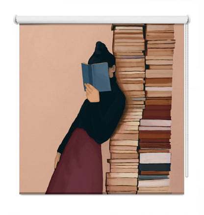 A decorative window roller shade featuring an artistic illustration of a woman in a black top and burgundy skirt reading a blue book next to a tall stack of books, shown against a beige background.