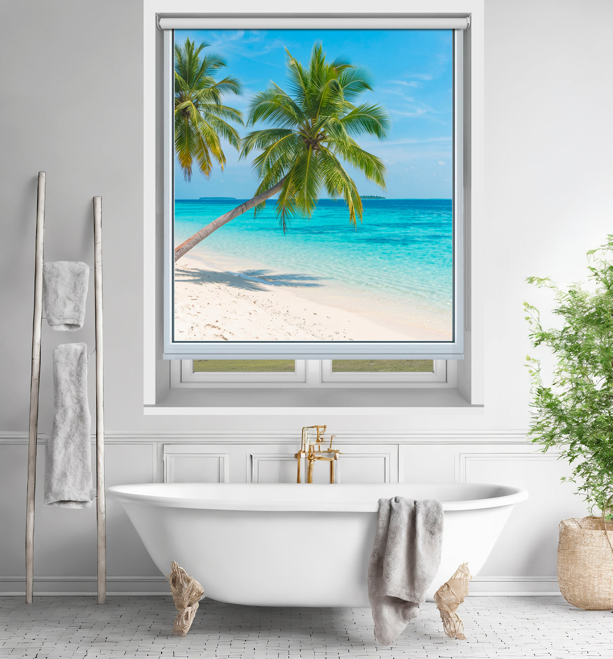 Art Fever scenic ocean view faux window roller blind showing leaning palm trees over turquoise water, styled behind a freestanding white bathtub.