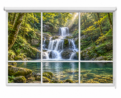 A window-style roller blind or shade panel printed with a scenic forest waterfall and clear pool, shown mounted against a white wall.