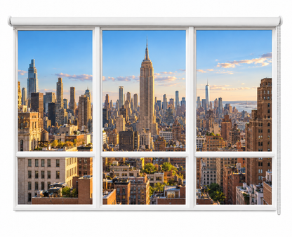 A white roller blind with a printed New York City skyline design, shown partially rolled down over a window frame against a white background.