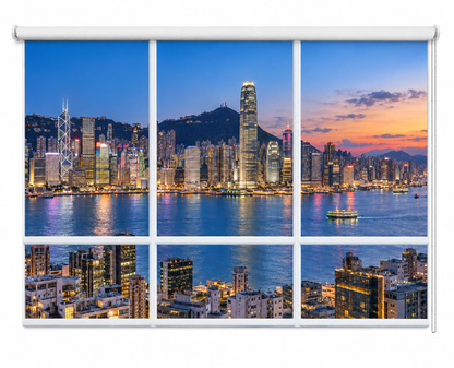 A six-panel roller blind or window shade printed with a panoramic view of the Hong Kong city skyline at dusk, shown mounted on a white rod against a plain white background.