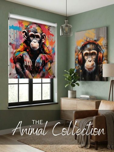 A colorful animal-themed roller blind featuring a painted chimpanzee portrait, shown installed on a window in a styled living room. The room has sage green walls, a wooden sideboard, a brown armchair, and a matching wall art print of a chimpanzee wearing headphones.