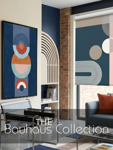 A modern living room interior showing abstract wall art and a matching roller blind with Bauhaus-inspired geometric shapes. The scene includes a sofa, glass table, brick column, shelving, and large text overlay reading 'THE Bauhaus Collection'.