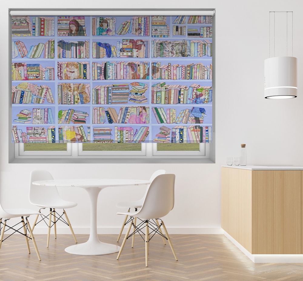 Printed roller blind featuring a colourful faux bookshelf design hanging in a modern white dining area
