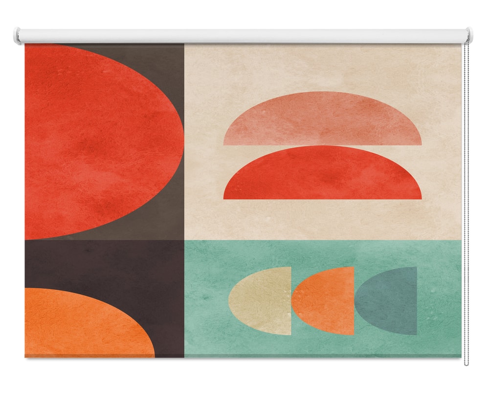 Geometricorange red and green colour blocks printed roller blind showing modern contrasting shapes on a window by Art Fever